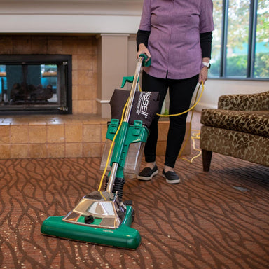 Side view of Bissell BigGreen Commercial ProCup upright vacuum for commercial carpet cleaning