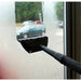 BISSELL Hercules Vapor Scrub steam cleaner attachment cleaning a window
