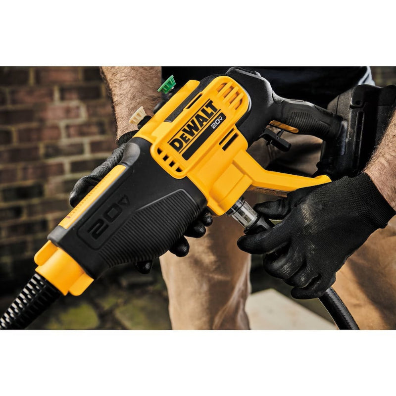 DEWALT DCPW550P1 battery powered pressure washer connected to water source