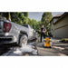 DEWALT 3000 PSI electric pressure washer cleaning driveway