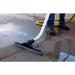 Dustless Technologies Slurry Vacuum collecting wet slurry with floor squeegee