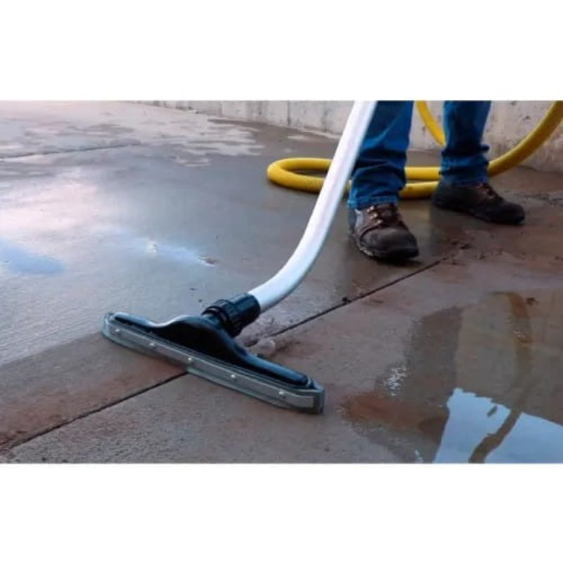 Dustless Technologies Slurry Vacuum collecting wet slurry with floor squeegee