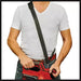 Einhell 3433647 operator wearing the shoulder strap