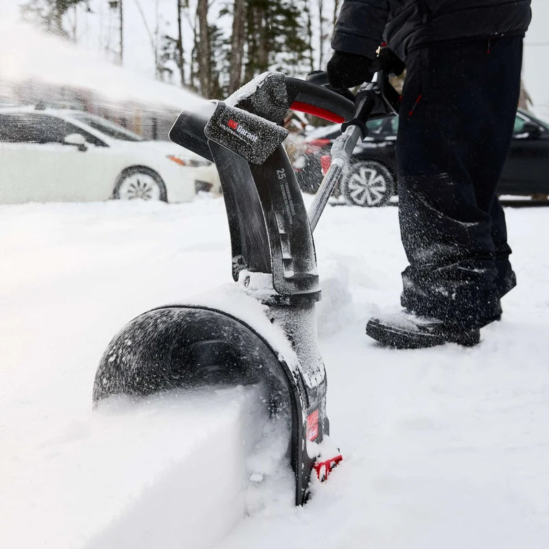 Garant 85805 cordless snow shovel clearing snow from a walkway