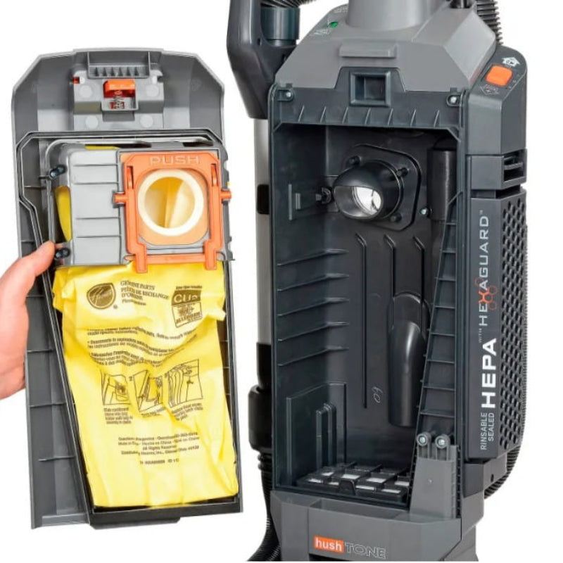 Disposable bag compartment open on Hoover HushTone 13 vacuum