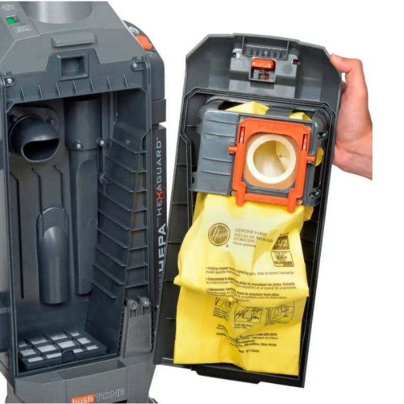 Disposable bag compartment open on Hoover HushTone 15 vacuum