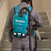 Makita cordless backpack vacuum used for construction jobsite cleaning