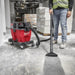 Milwaukee M18 FUEL 9-gallon wet dry vacuum mounted on cart