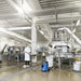 Nilfisk AERO 26 professional wet and dry vacuum cleaning a commercial facility floor