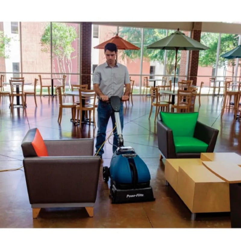 compact auto scrubber cleaning retail store floors for commercial cleaning business