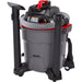 Rear view of RIDGID RT1200 with hose, wands and nozzles stored on the vacuum