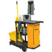 RMP Maintenance Products janitor cleaning cart being used by a commercial cleaner in an office building to transport cleaning supplies and collect waste.