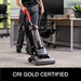 Sanitaire SC5745D cleaning office carpet in a manufacturer image marked CRI Gold Certified